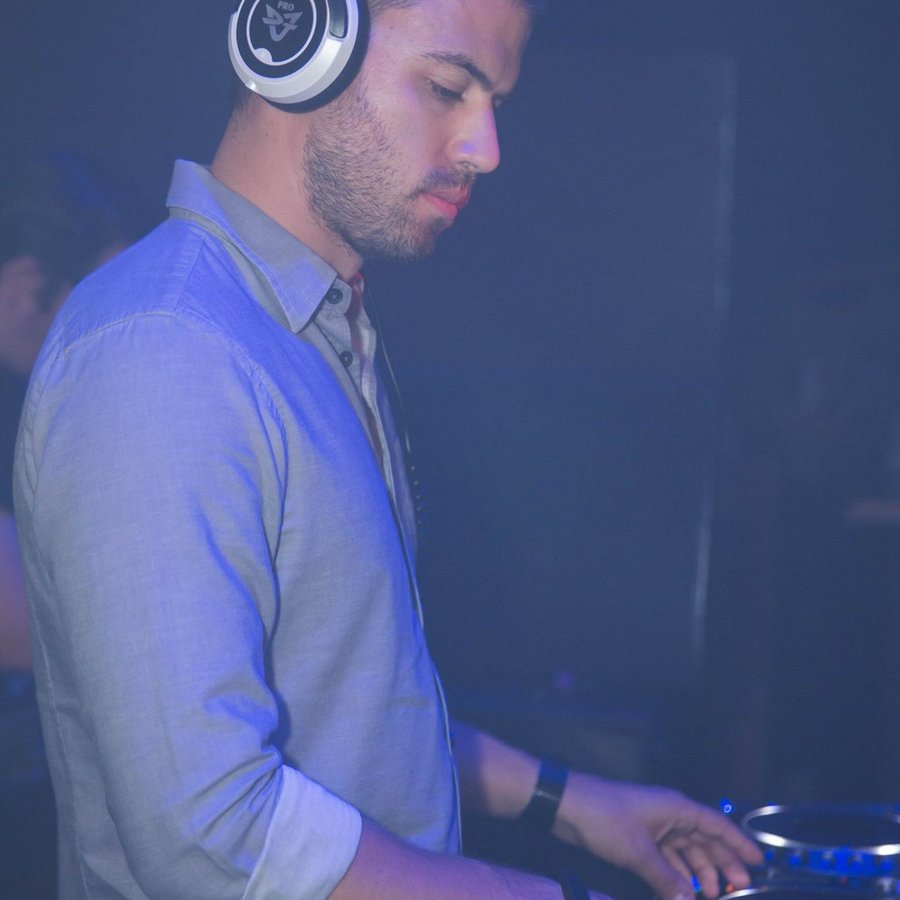 DJ mixing, blue stage lighting